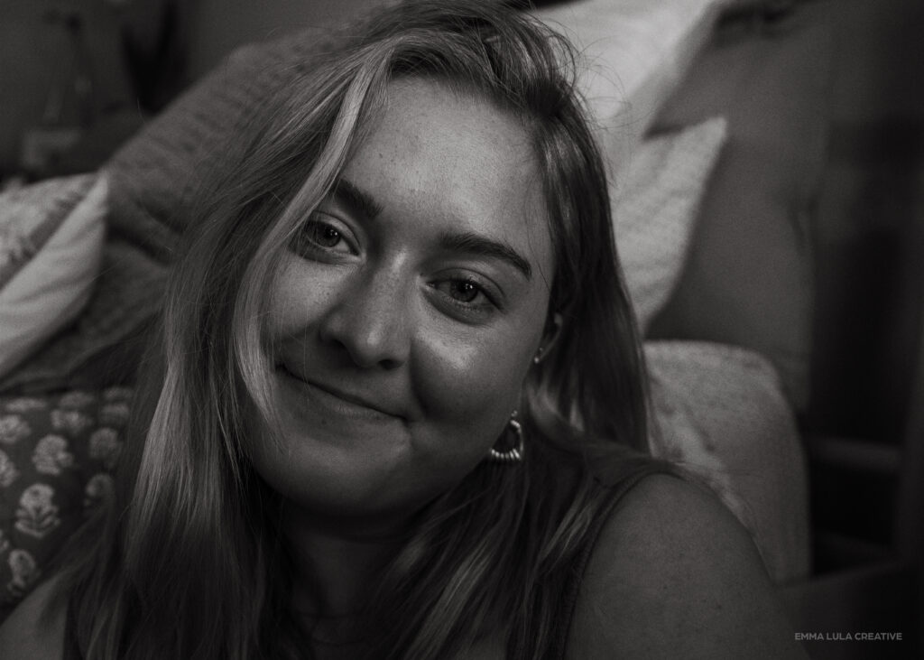 Woman smiling at camera for self portrait photoshoot in Massachusetts with Emma Lula Creative.