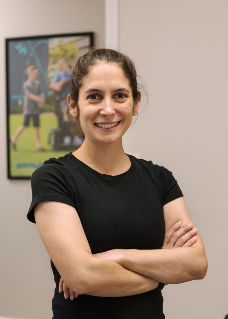 Headshot of owner, Jenna, of Raheb Physical Therapy.