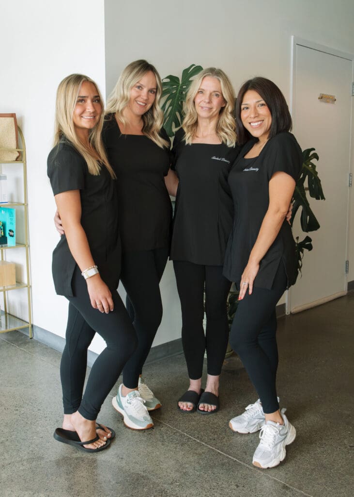 Group photo of all-women team at Sinead Beauty during brand photoshoot with Emma Lula Creative.